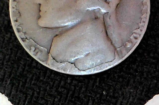 A-Mysterious,-Clad-Less,-Unidentifiable-Jefferson-Nickel
