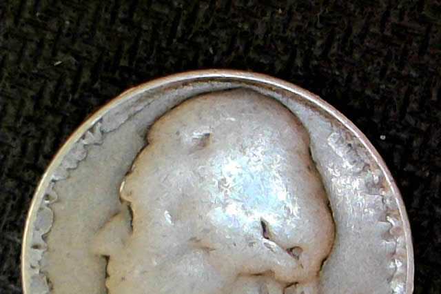 A-Mysterious,-Clad-Less,-Unidentifiable-Jefferson-Nickel