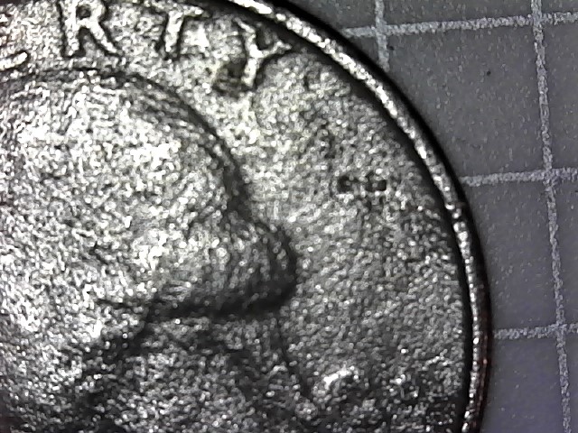 1991-D-Quarter-Damage-Or-Strike-Through-Grease,-Thanks-To-Who-Might-Know.