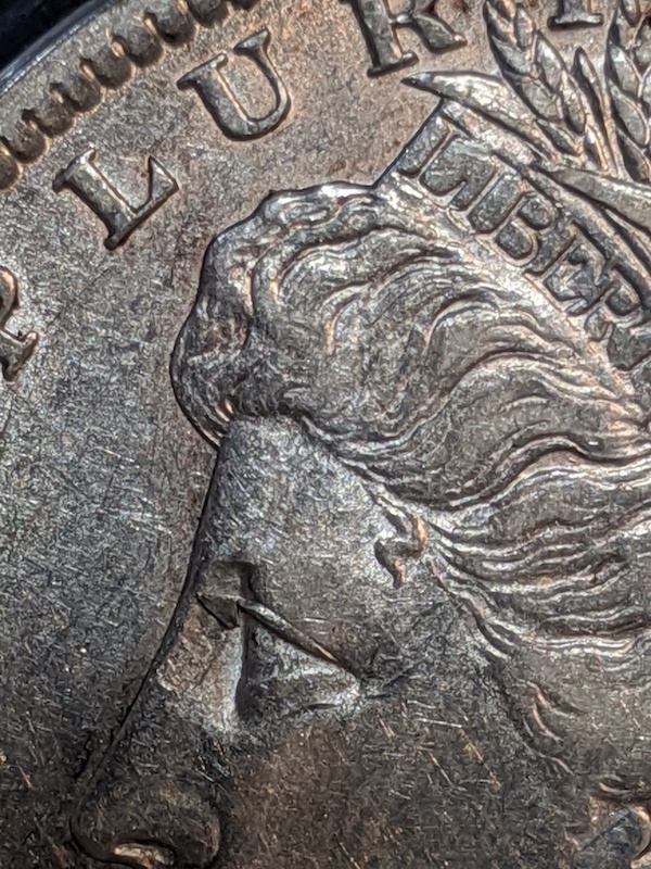 1886-O-Morgan-Lamination
