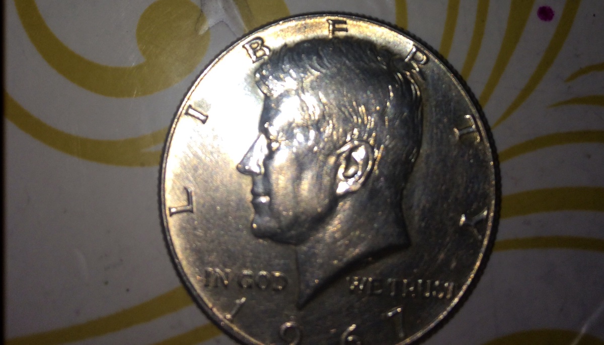 Mark-On-Kennedy�s-Chin-On-1967-Half-Dollar