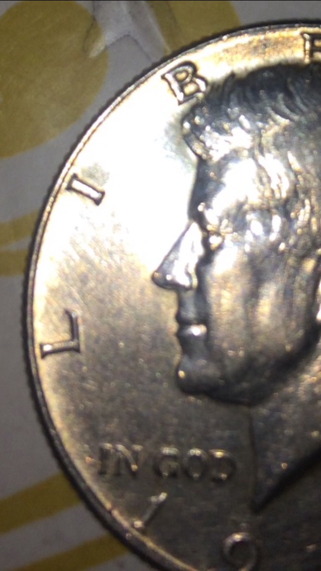 Mark-On-Kennedy�s-Chin-On-1967-Half-Dollar