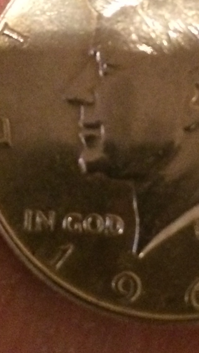 Mark-On-Kennedy�s-Chin-On-1967-Half-Dollar