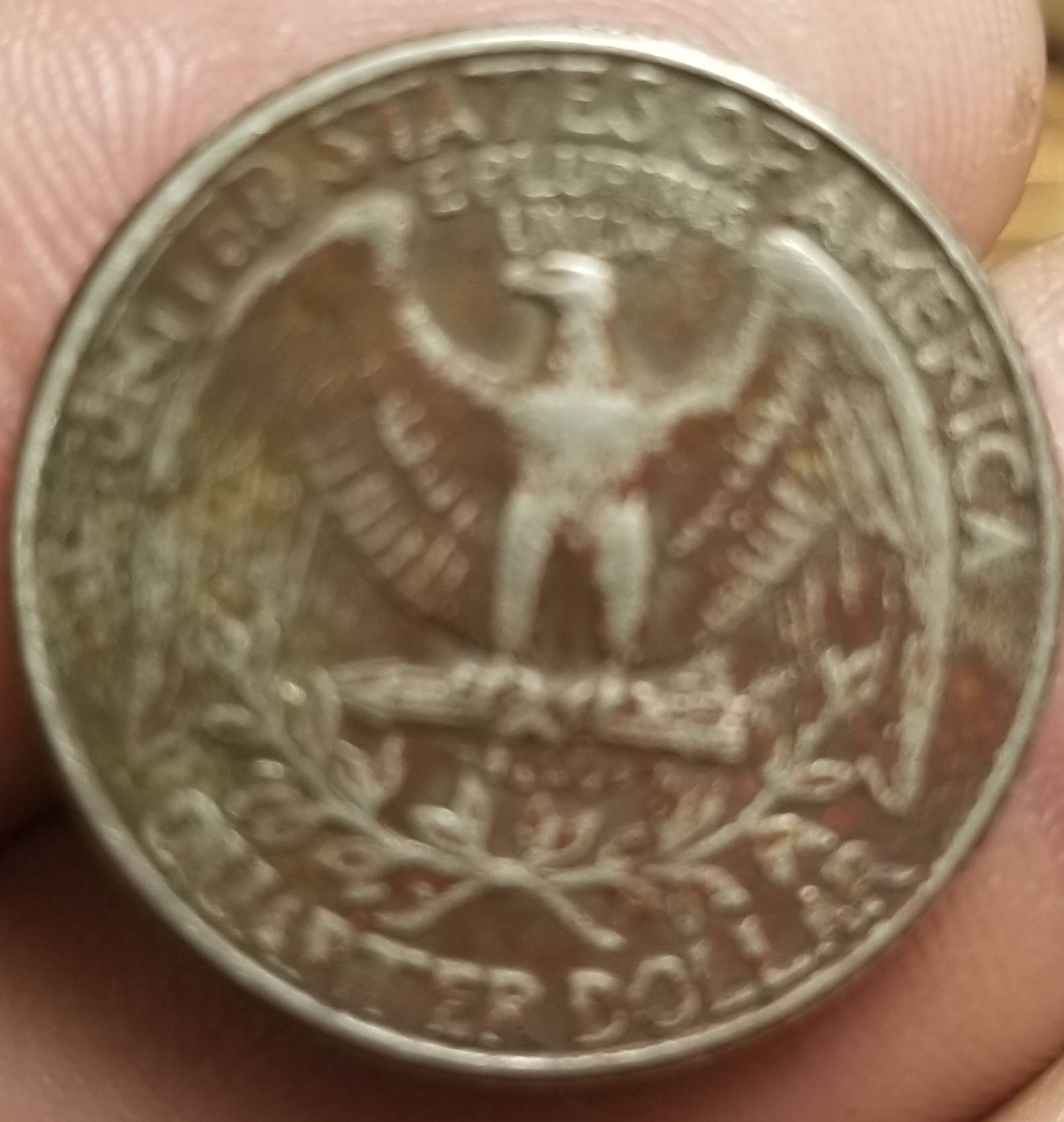 1977-Quarter-With-A-Edge-On-Rim
