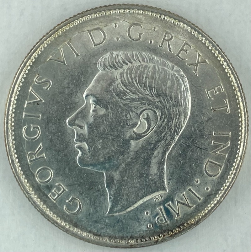 Die-Cracks-On-A-1942-50-Cent-Piece