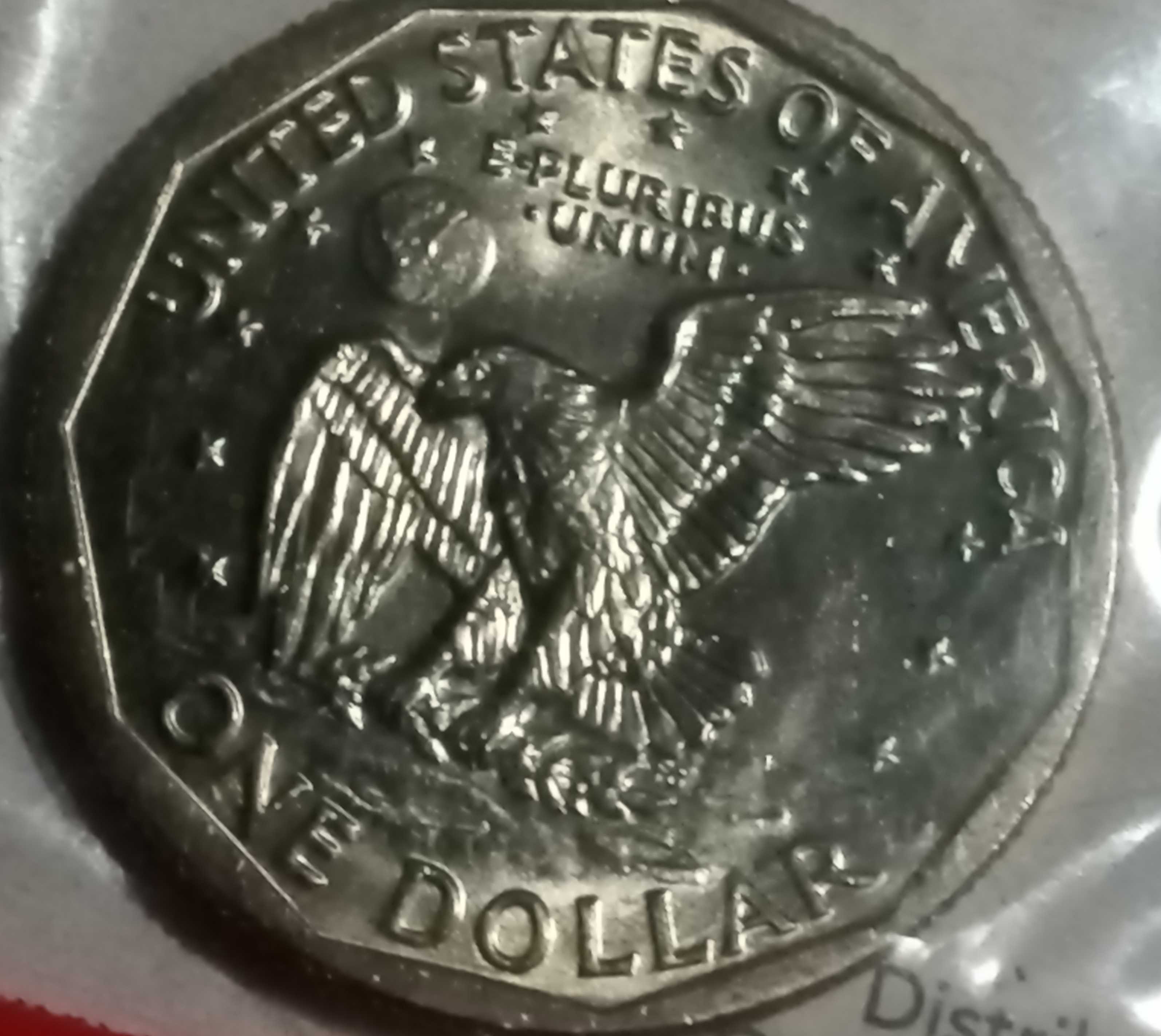 Uncirculated-SBA-Dollar-In-Intact-Mint-Cellophane-With-Mystery-Scratch