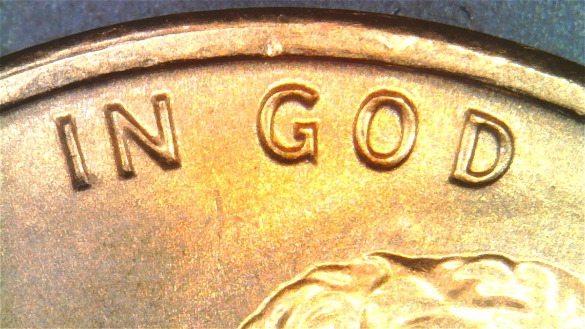 1983-LMC-Extra-Partial-E-On-Rim-Of-We-On-Obverse