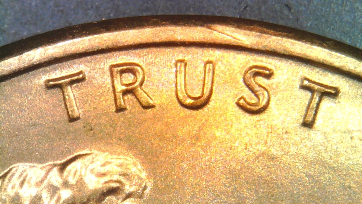 1983-LMC-Extra-Partial-E-On-Rim-Of-We-On-Obverse