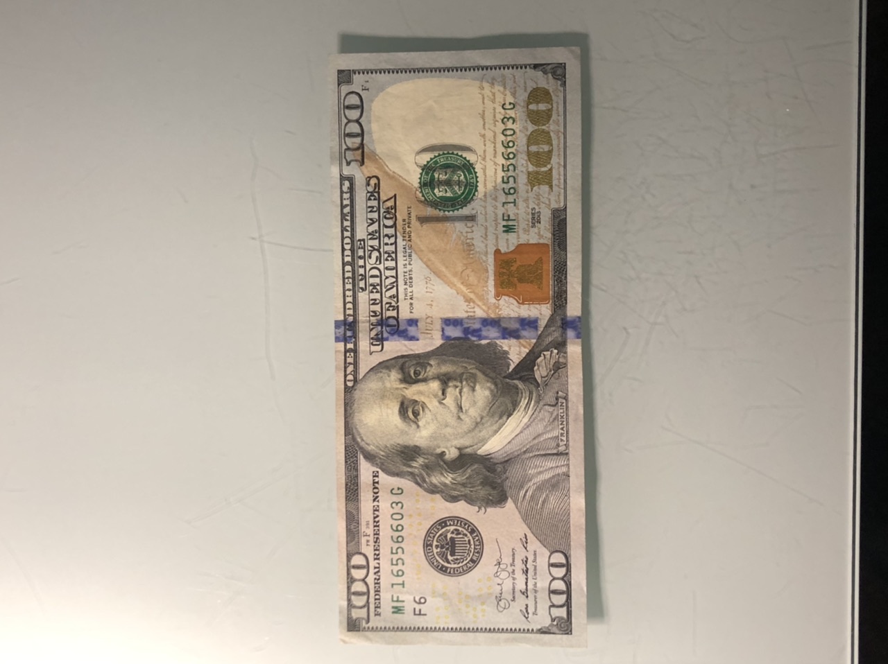 100-Dollar-Bill-Reverse-Bottom-Right-Corner-Has-An-Unknown-Print