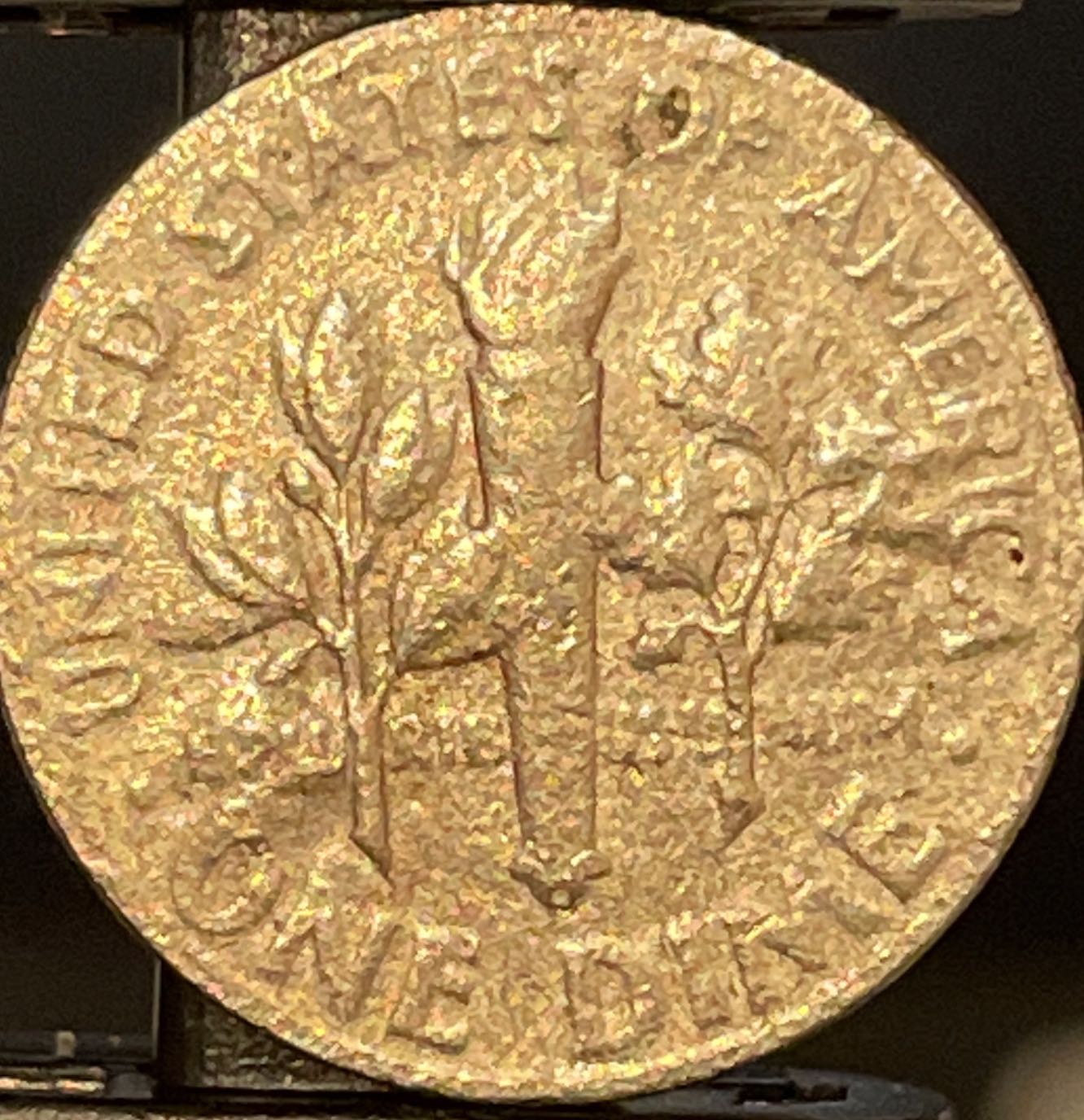 Weird-1978-Nmm-Dime-I-Found.-Does-Anyone-Know-What-The-Print-Is-On-The-Face-Of-The-Dime?