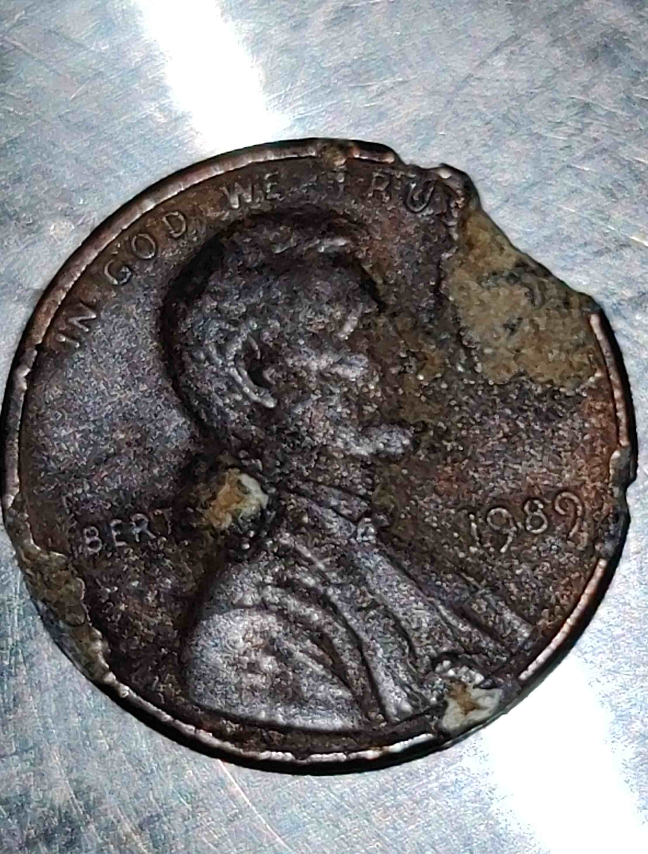 Is-This-Post-Dmg-Or-Mint-1989-Clipped-Penny-I-Believe,-Any-Help-Out-There?-Possible-Strike-Throughs?