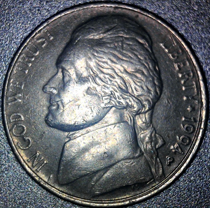 Error-Or-Minting-Mistake-Found-On-A-1994-P-Nickel-Collar-Area.