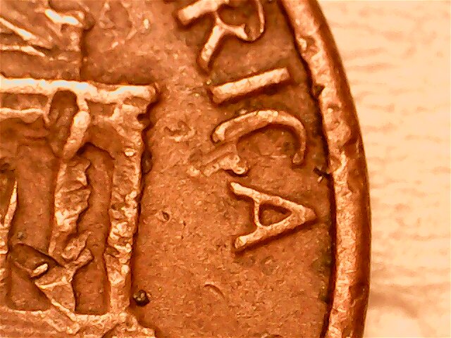 1975-D-Penny.-Punch-Throughs?