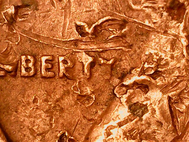 1975-D-Penny.-Punch-Throughs?
