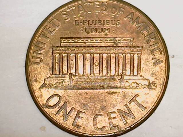 What-Causes-These-Lines-To-Form-On-A-Coin?-And-Why-Do-They-Show-Up-Kinda-Black-To-The-Naked-Eye?