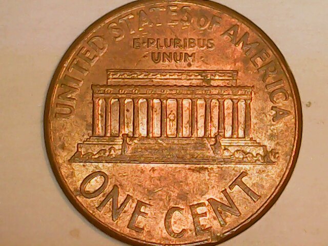 What-Causes-These-Lines-To-Form-On-A-Coin?-And-Why-Do-They-Show-Up-Kinda-Black-To-The-Naked-Eye?