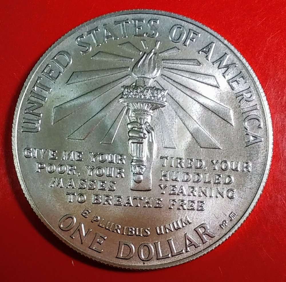 1986-P-Ellis-Island-Comm-Dollar-DD0-With-Strike-Doubling