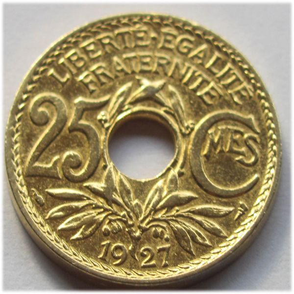 Common-Twentieth-Century-Coins-Of-Gold-Color,-But-Not-Gold.