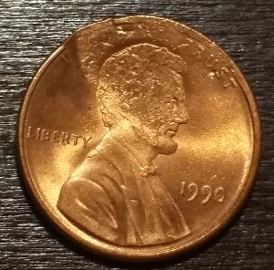 1990-LMC-Major-Struck-Through-Possible-Washer?-Or-Damage?