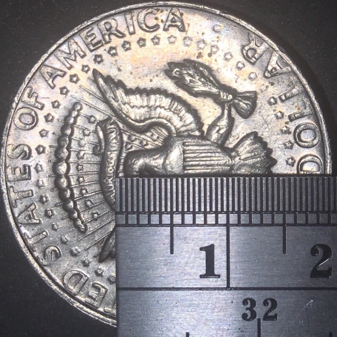 Am-I-Seeing-A-Little-Bit-Of-Reverse-On-This-Obverse?-1983-P-Kennedy-50c
