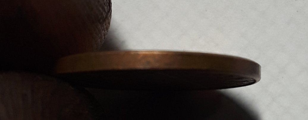 1968-Lincoln-Coin-Shaped-Like-A-Wedge,-Plating-Coming-Off?-Huh?