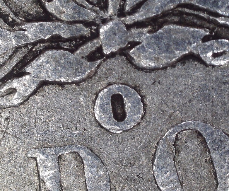 1900-Morgan$1-O/Cc-?-I-Think-It-Looks-1-Of-The-VAM-#'s7-12--Please-Advise
