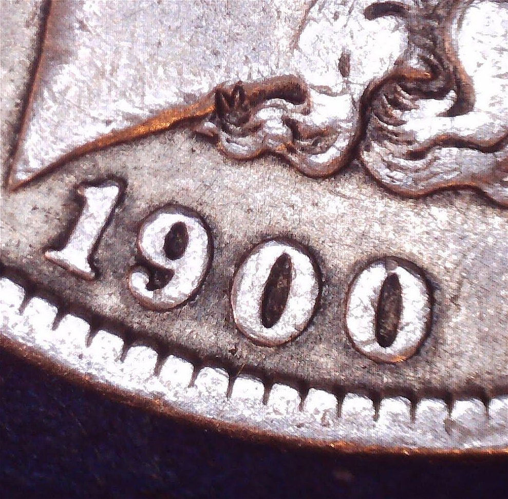 1900-Morgan$1-O/Cc-?-I-Think-It-Looks-1-Of-The-VAM-#'s7-12--Please-Advise