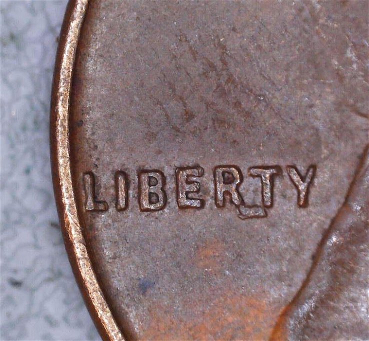 1953-Wheat-Cent--Extra-L-In-Liberty-Or-Something-Else.-Please-Advise