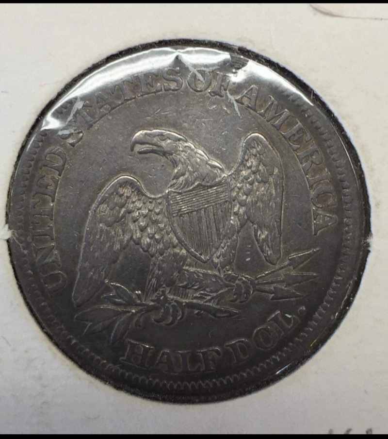 Has-This-1865-Seated-Lib-Half-Been-Cleaned