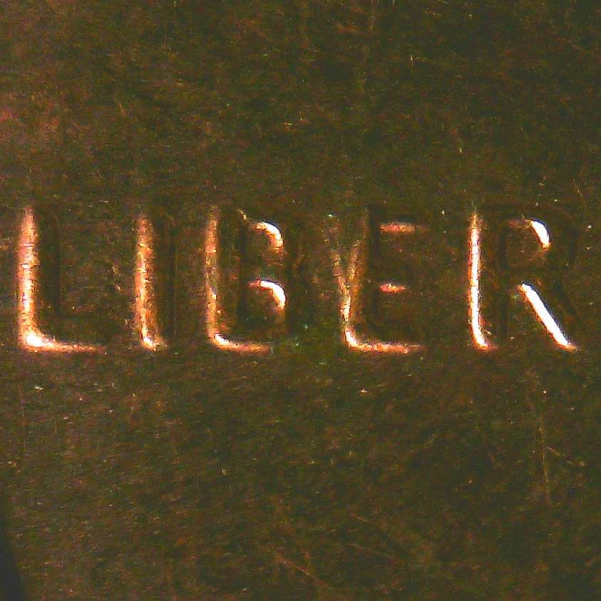 2015-D-Penny-With-A-Part-Of-The-E-Missing-In-Liberty