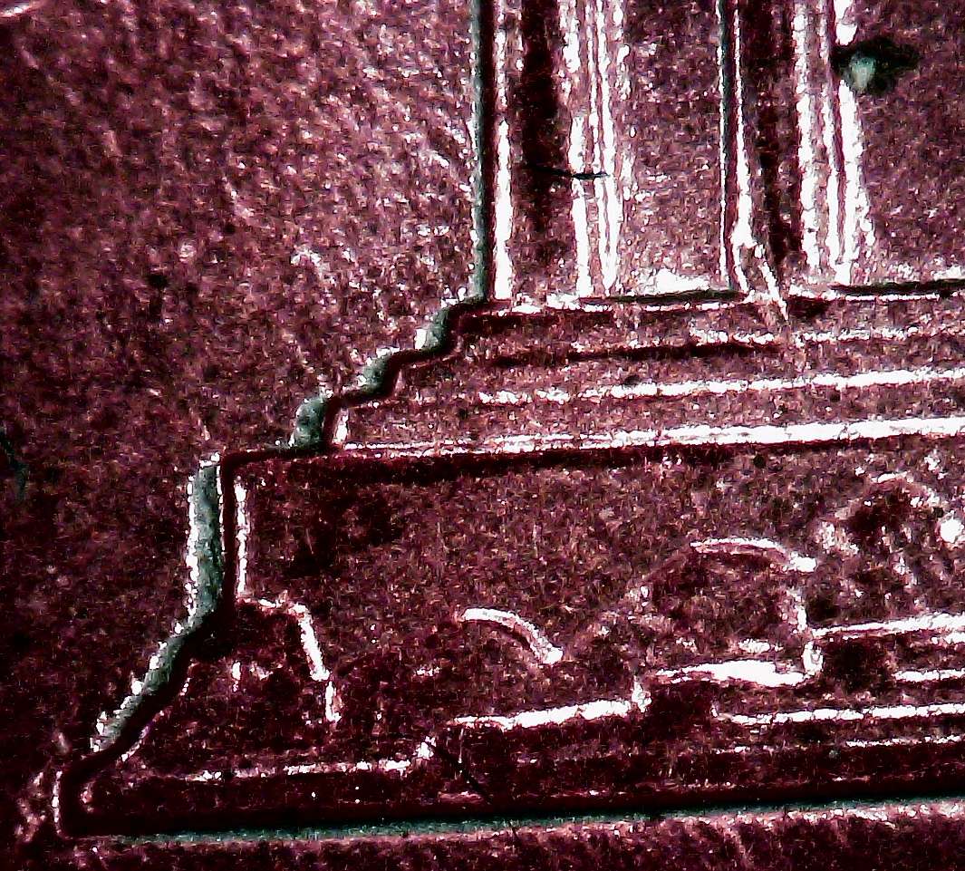 1991-P-Delamination-On-The-Edge-Of-A-Lot-Of-Devices.