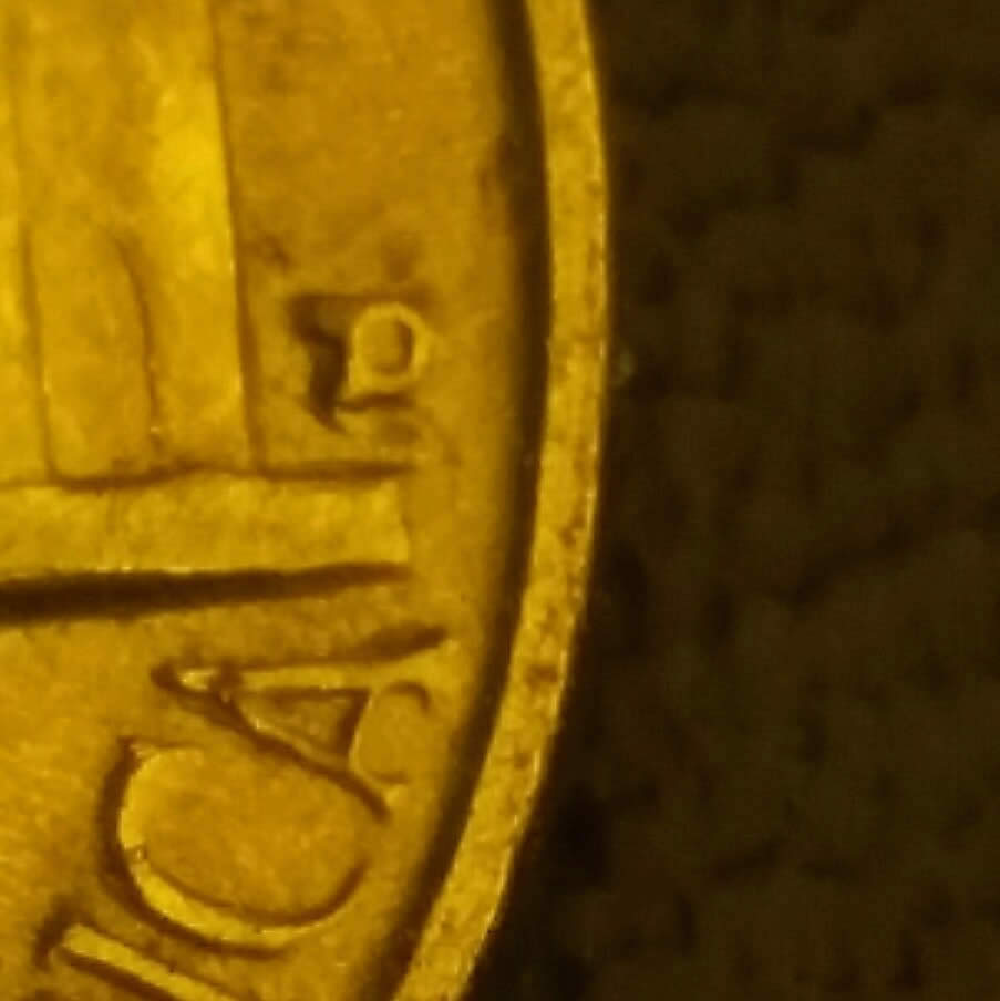 Not-Sure-If-It's-A-Mint-Mark-Over-Mimy-Mark-1958-D-5c-Jeffeson-Nickel