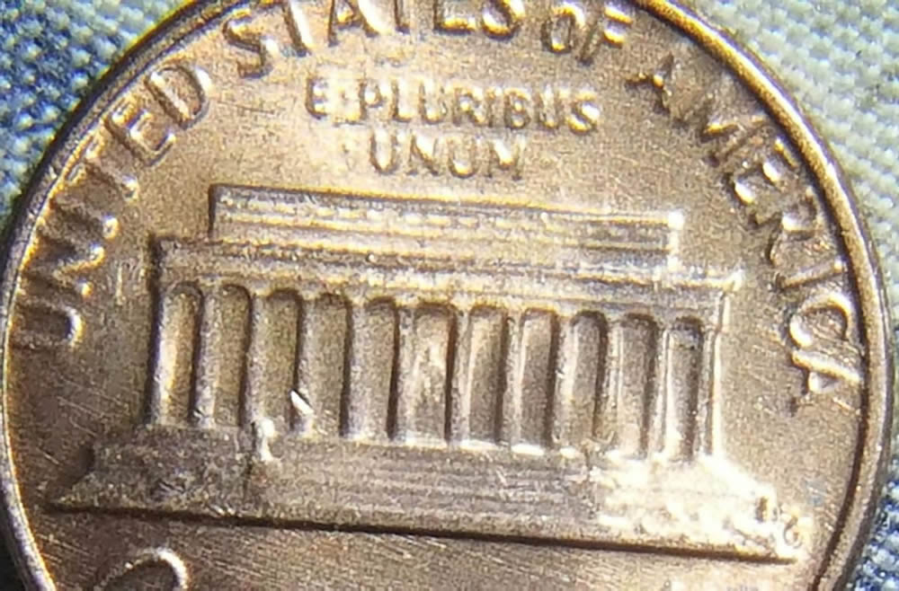 Why-Does-This-1982-Copper-Have-A-Globbed-Up-FG