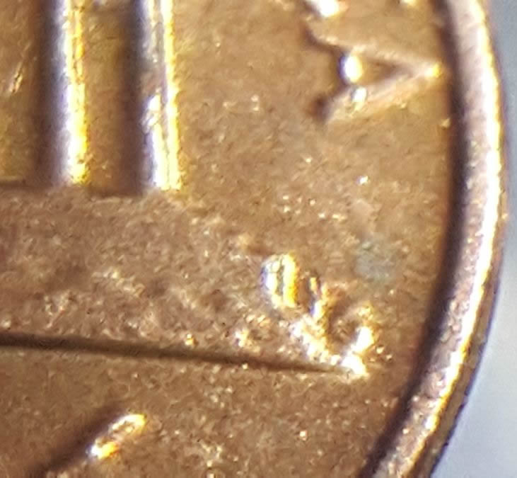 Why-Does-This-1982-Copper-Have-A-Globbed-Up-FG