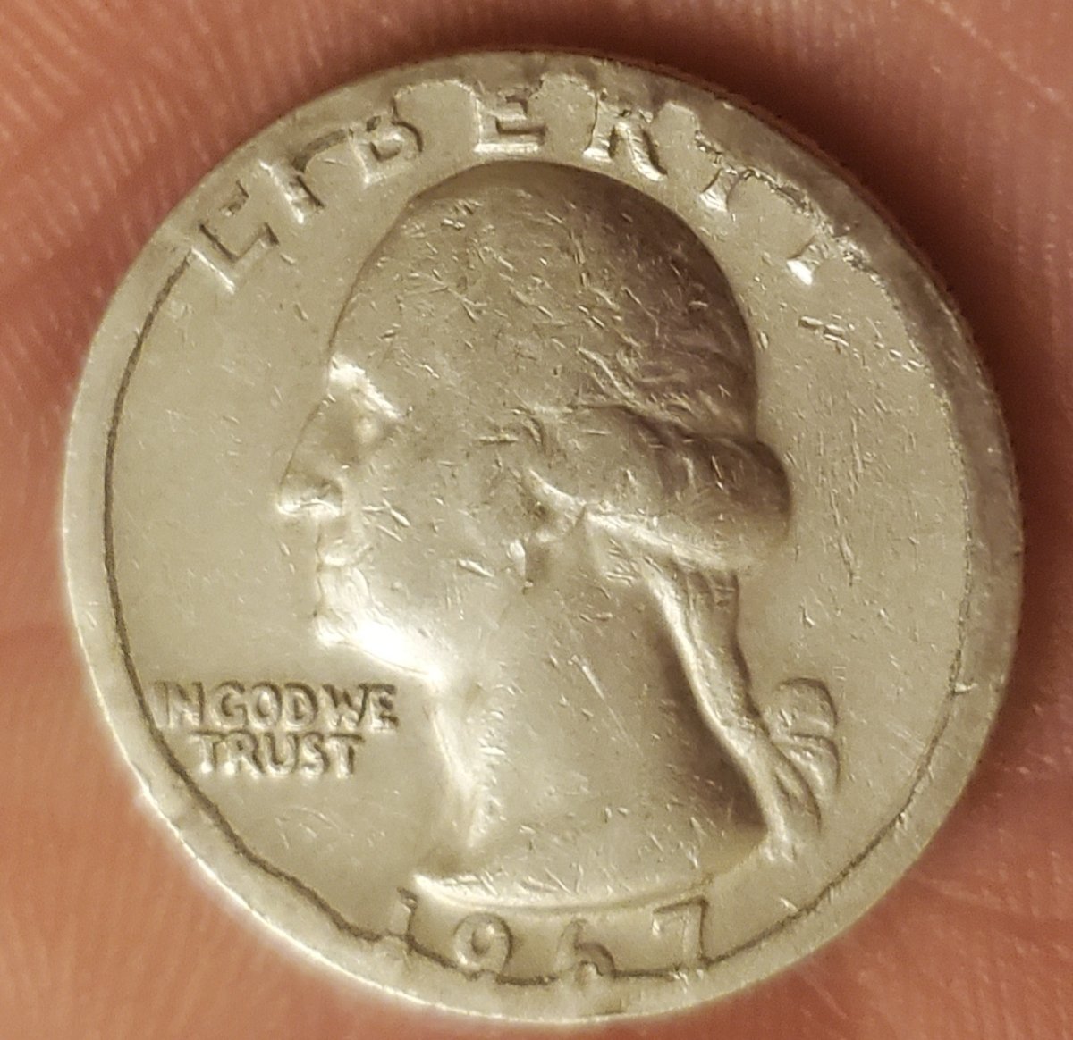 1967-Quarter.-Thoughts?-Planchet-Issue,-Folding,-Melting?