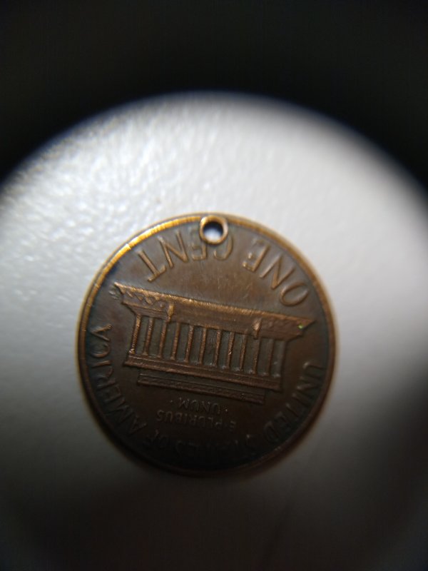 Hole-In-Penny?-Anyone-Know-Why?