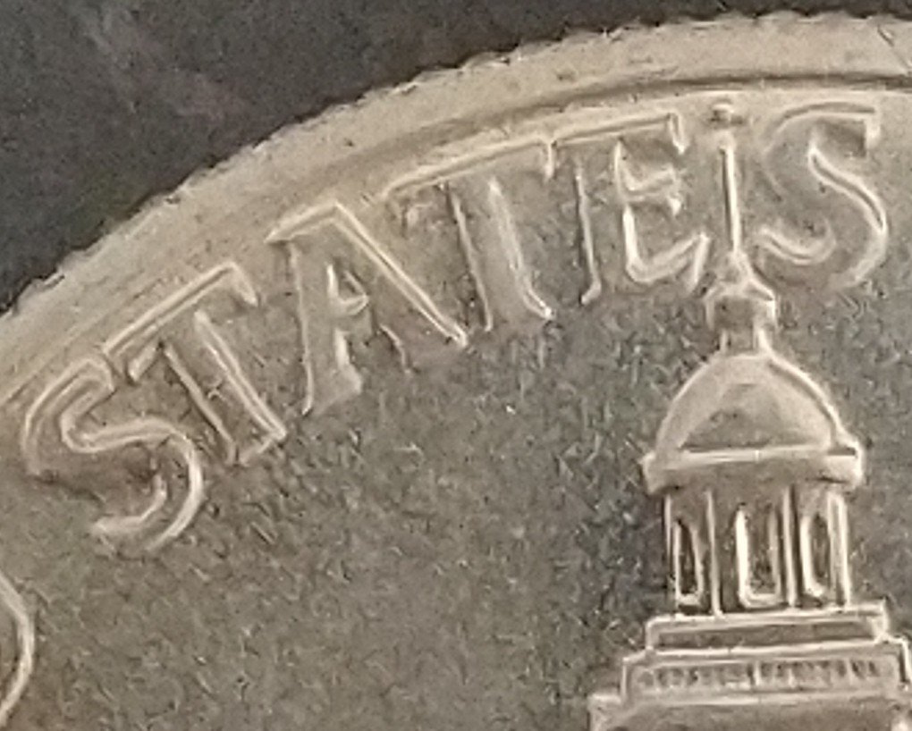 1976-S-50c---Silver-Clad-MS-Suspected-DDR