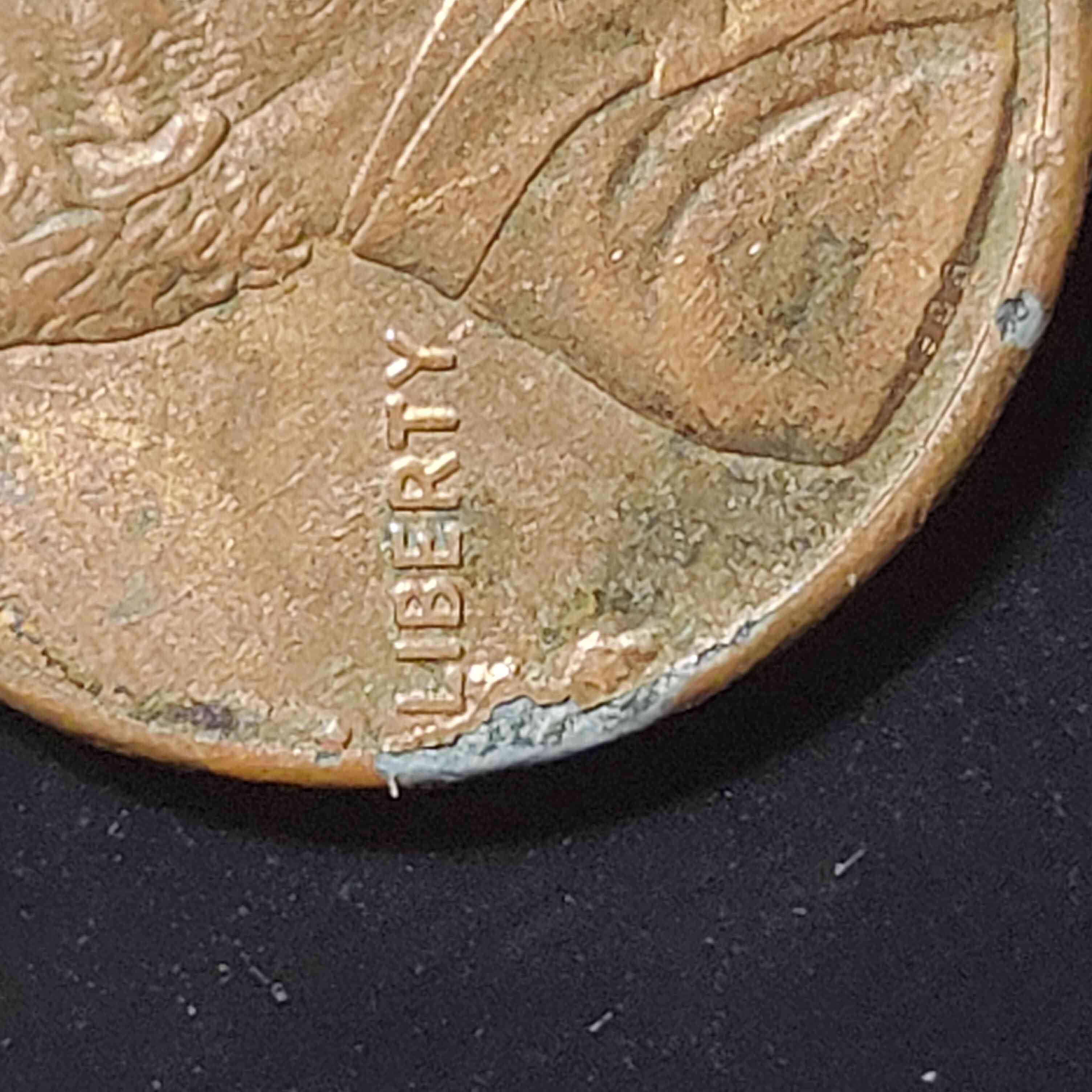 Hmm-1992-Penny-With-Cuds-And-Who-Knows-What-Else-Is-Goin-On-With-This-Bad-Boy.