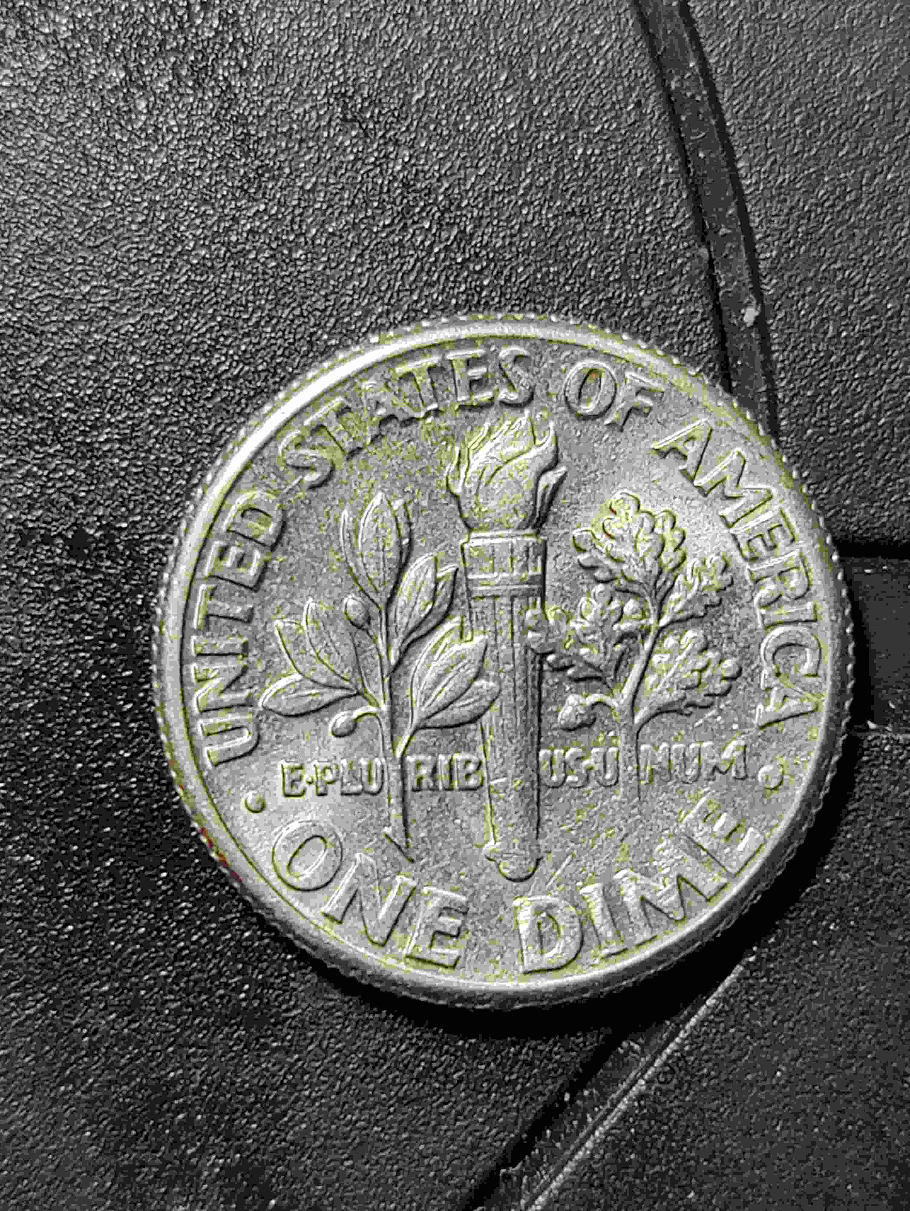 1989-Dime--Bands-On-Bottom-Of-Torch-Didn't-Take-But-The-Other-Bands-Are-There.