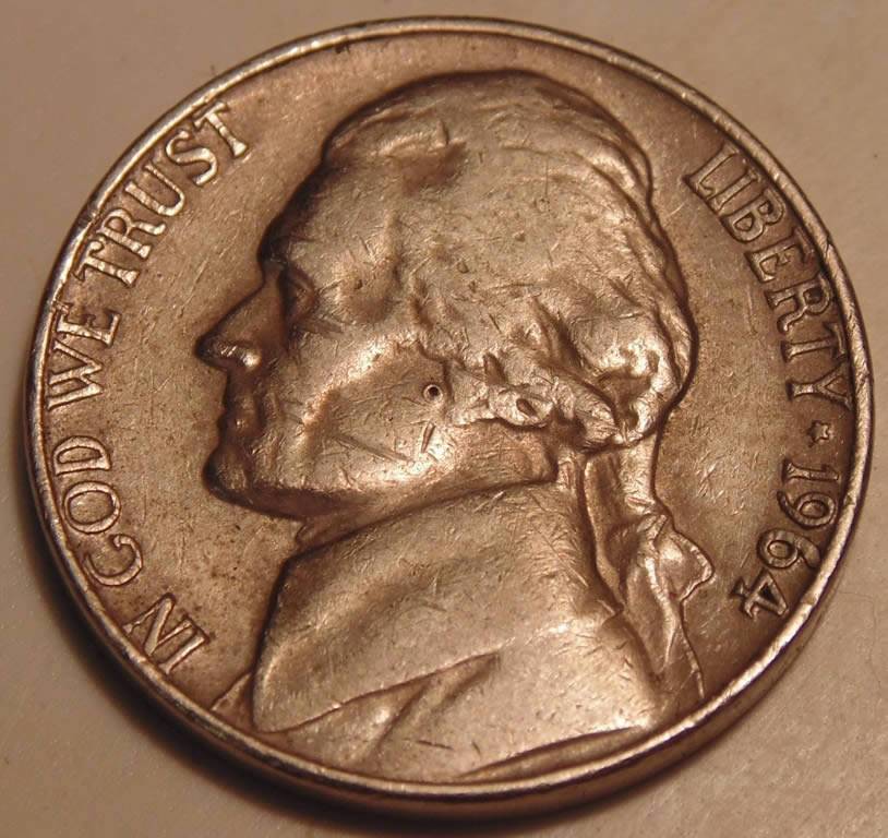 1964-Nickel-Hole-On-The-Cheek.
