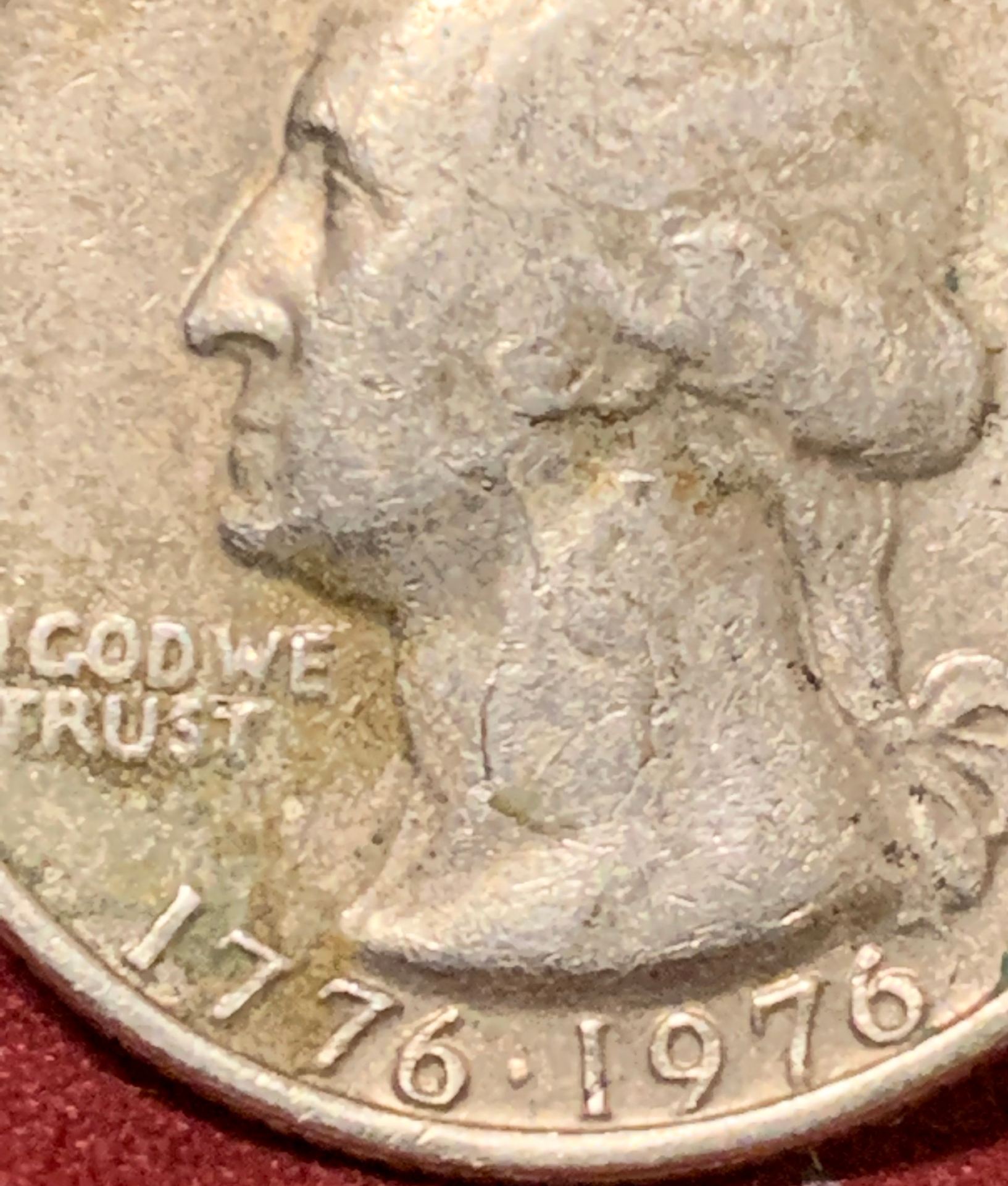 1976-Bicentennial-Quarter,-Badly-Battered.-Is-It-Damaged-From-The-Mint-Or-Old-Age?