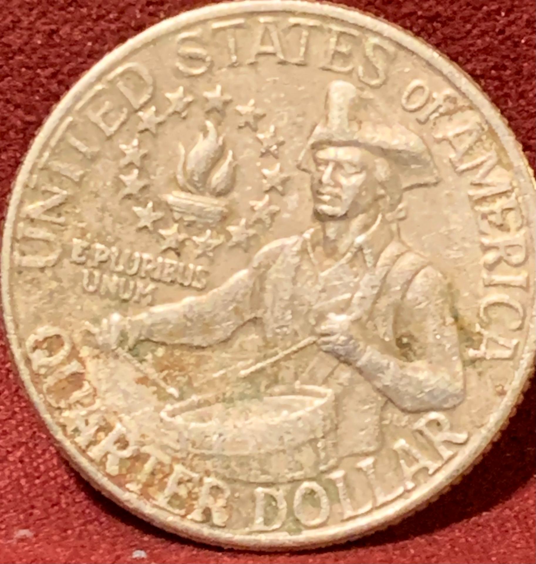 1976-Bicentennial-Quarter,-Badly-Battered.-Is-It-Damaged-From-The-Mint-Or-Old-Age?