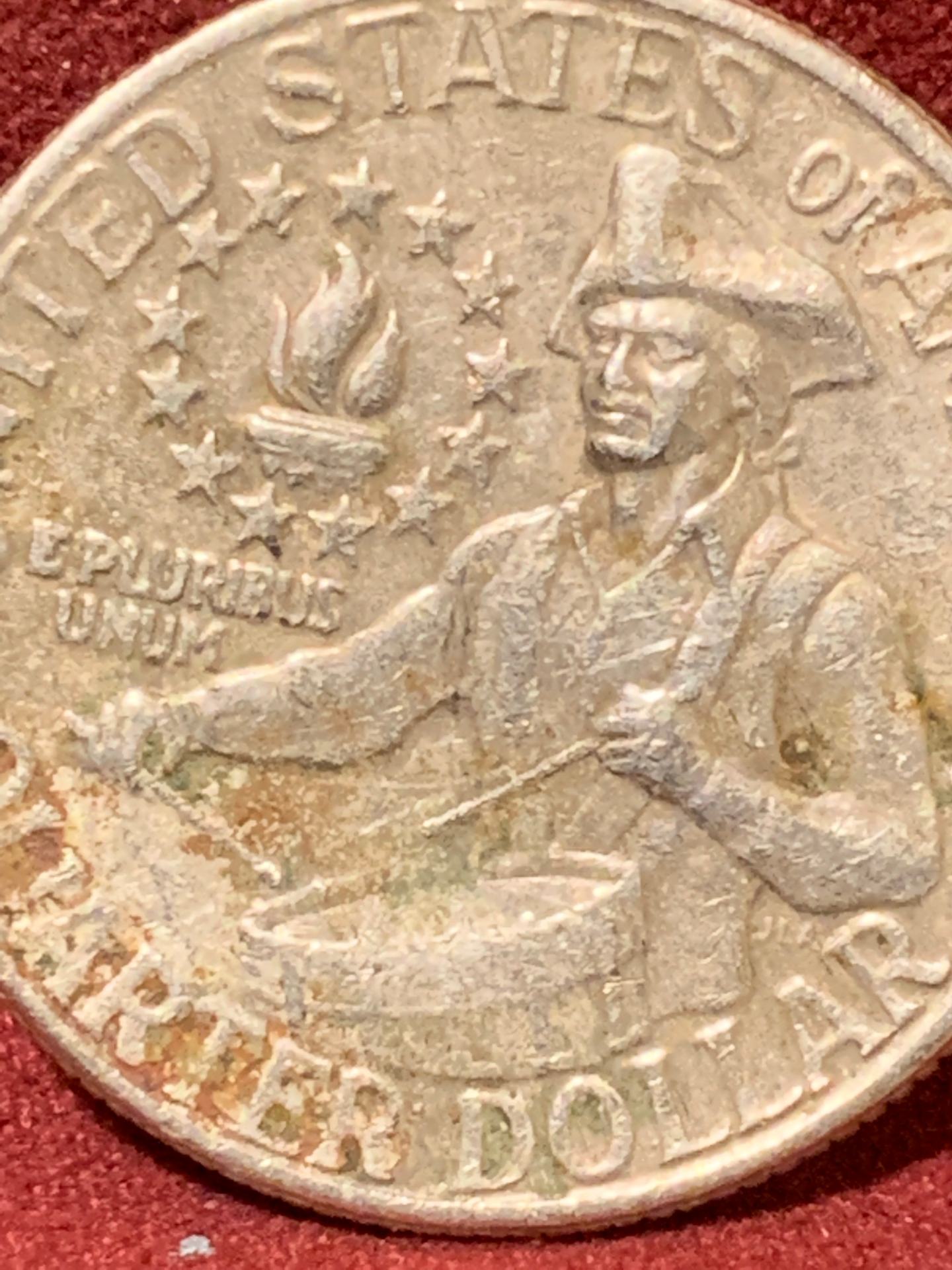 1976-Bicentennial-Quarter,-Badly-Battered.-Is-It-Damaged-From-The-Mint-Or-Old-Age?