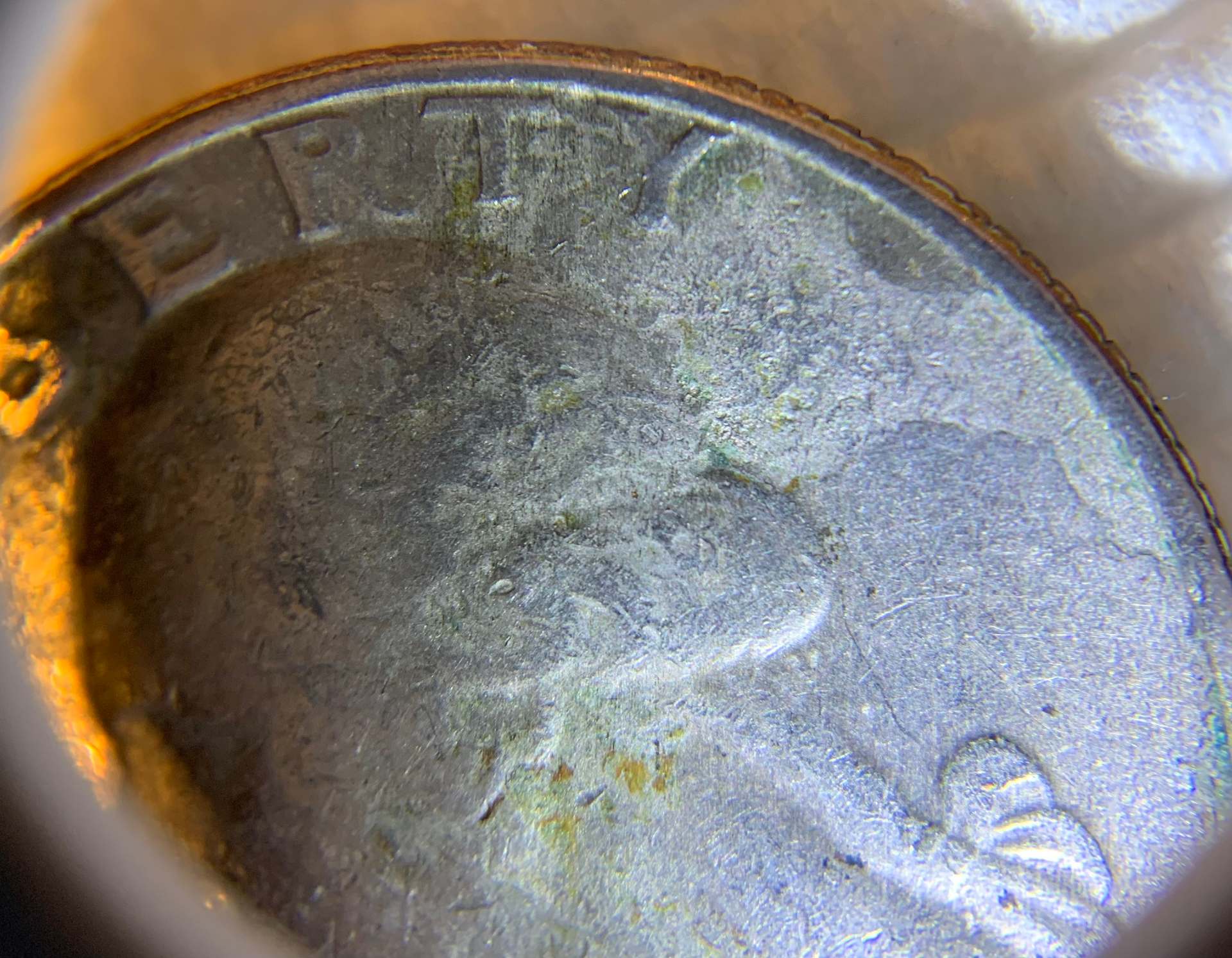 1976-Bicentennial-Quarter,-Badly-Battered.-Is-It-Damaged-From-The-Mint-Or-Old-Age?