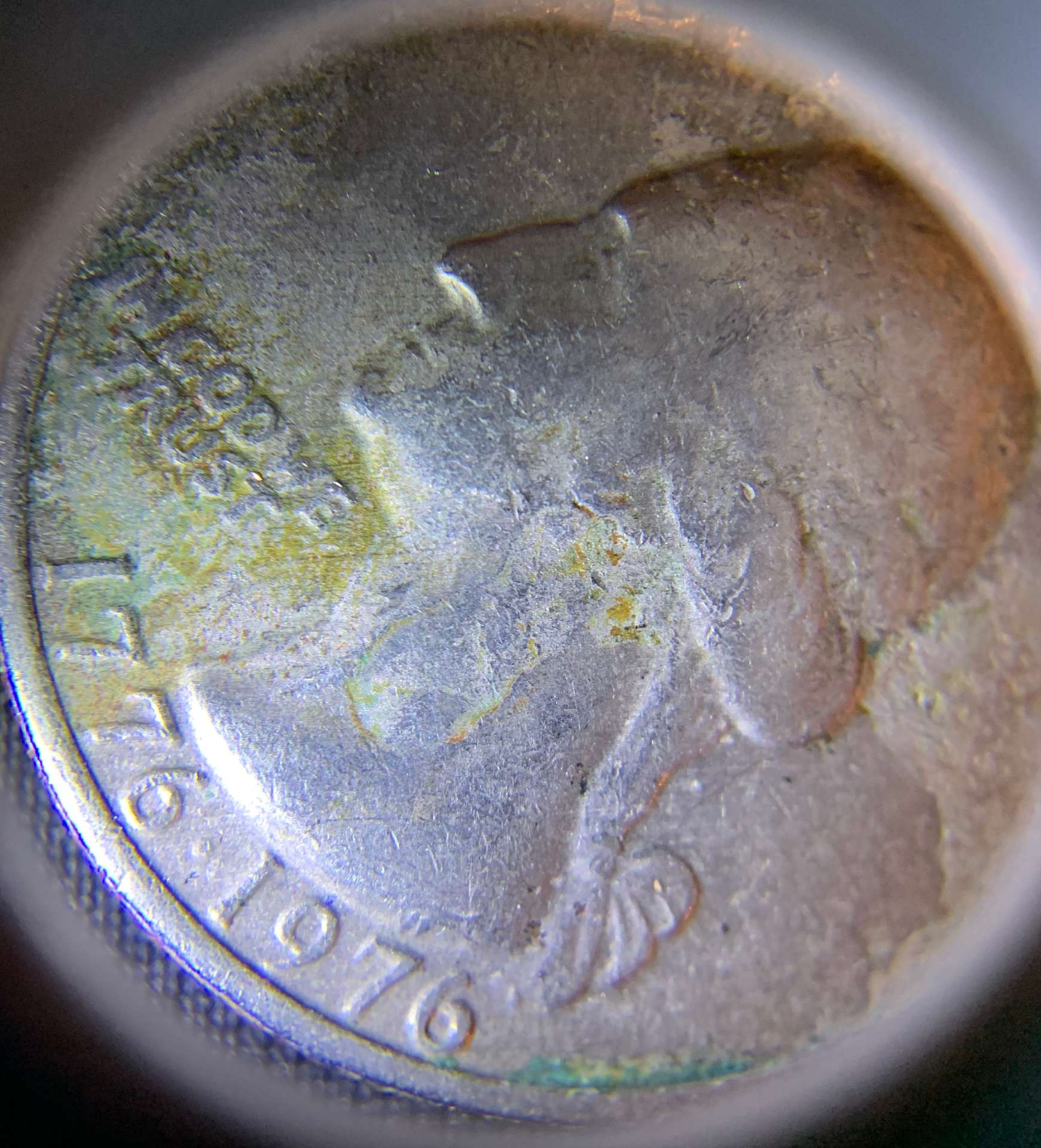 1976-Bicentennial-Quarter,-Badly-Battered.-Is-It-Damaged-From-The-Mint-Or-Old-Age?