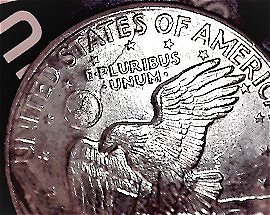 1971-Ike-Dollar-With-Something-Underneath-The-Strike?-Doubling-As-Well-Help