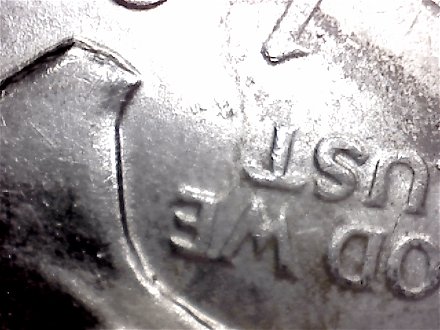 1971-Ike-Dollar-With-Something-Underneath-The-Strike?-Doubling-As-Well-Help