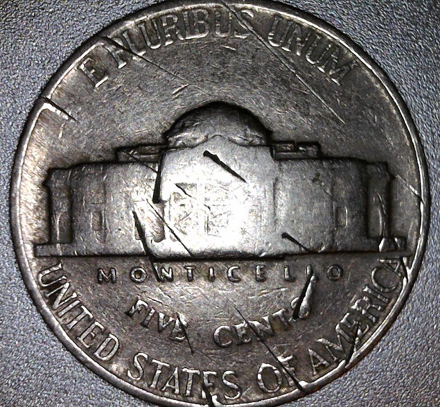 Interesting-Pm-Damage-On-A-1940-Nickel