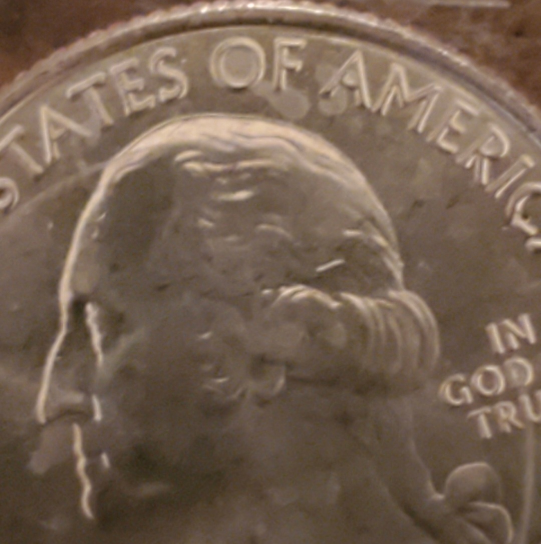 2019-Idaho-Quarter-With-Staining-Or-Toning?