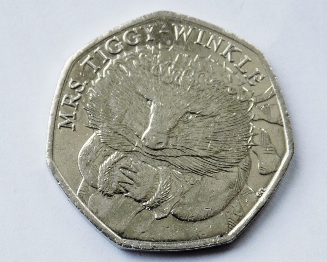Post-Your-Coins-And-Medals-Designed-By-A-Woman